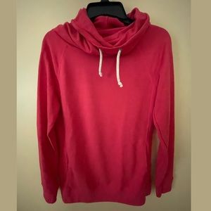 Pink active turtleneck with ties and front pocket